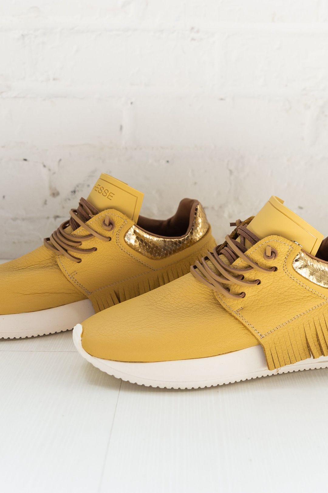Esseutesse Yellow Leather Fringe Sneaker ShopperBoard